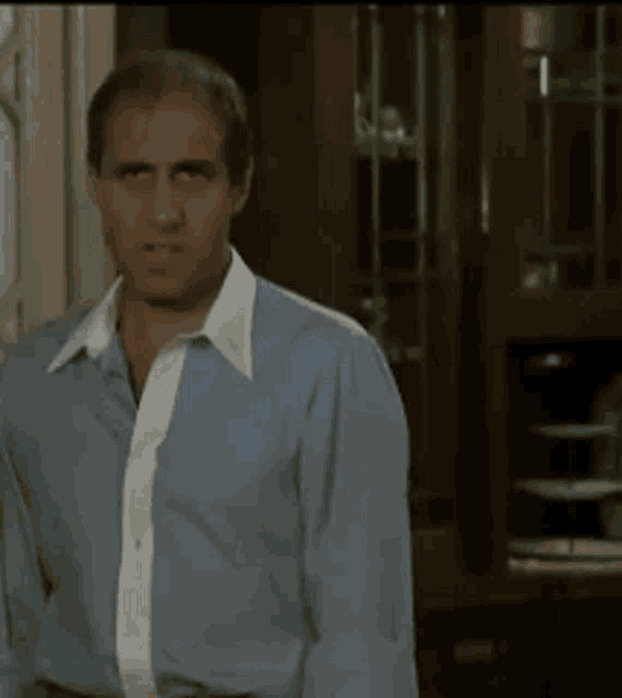 Adriano Celentano Shirt Off GIF. Adriano Celentano Shirt Off GIF.