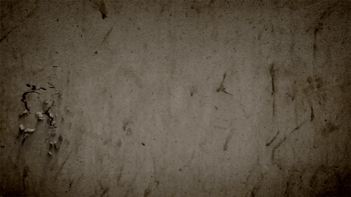 Анимированная надпись "С 23 февраля" на стене и горящим вечным огнём.