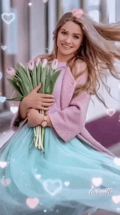 Гифка день женского счастья и праздник жизни 2024 с тюльпанами.