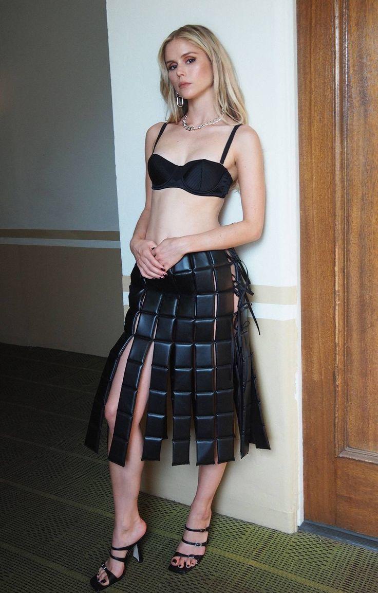 Ещё один снимок с блондинкой в нижнем белье и необычной юбке.