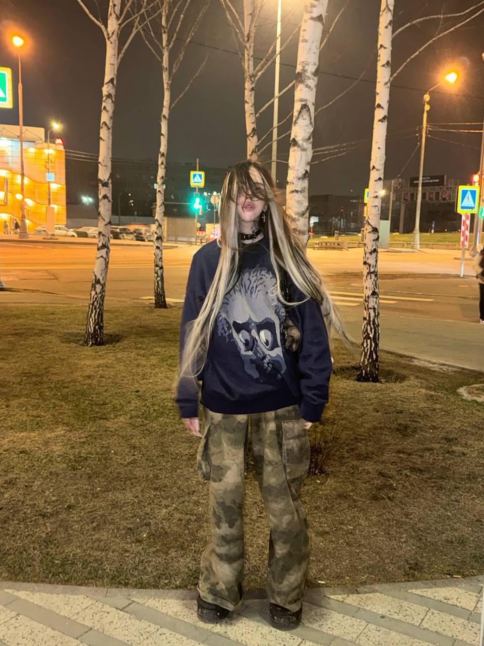 Снимок Лапа Хапа в реальной жизни в кофте и военных штанах на фоне берёз. Снимок Лапа Хапа в реальной жизни в кофте и военных штанах на фоне берёз.