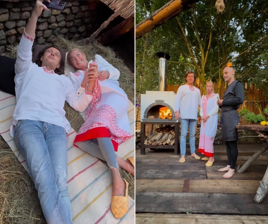 Фотографии Волочковой и Шаляпина в национальных костюмах около печи.